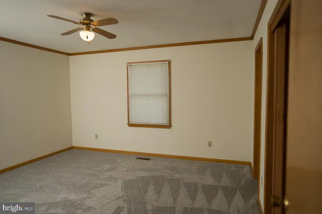 a bathroom with a sink a mirror and shower