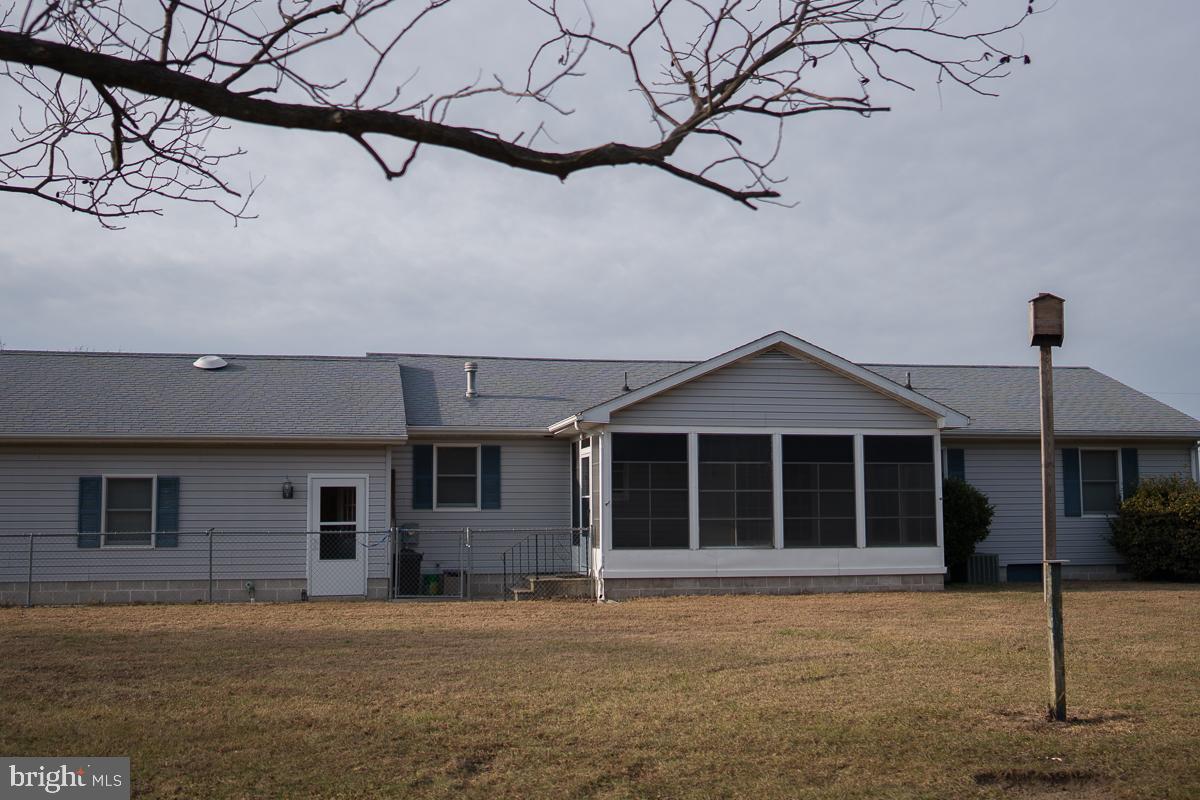 13148 Fleetwood Pond Road Seaford, DE 19973 - Photo 19 of 25 a front view of a house with a large window