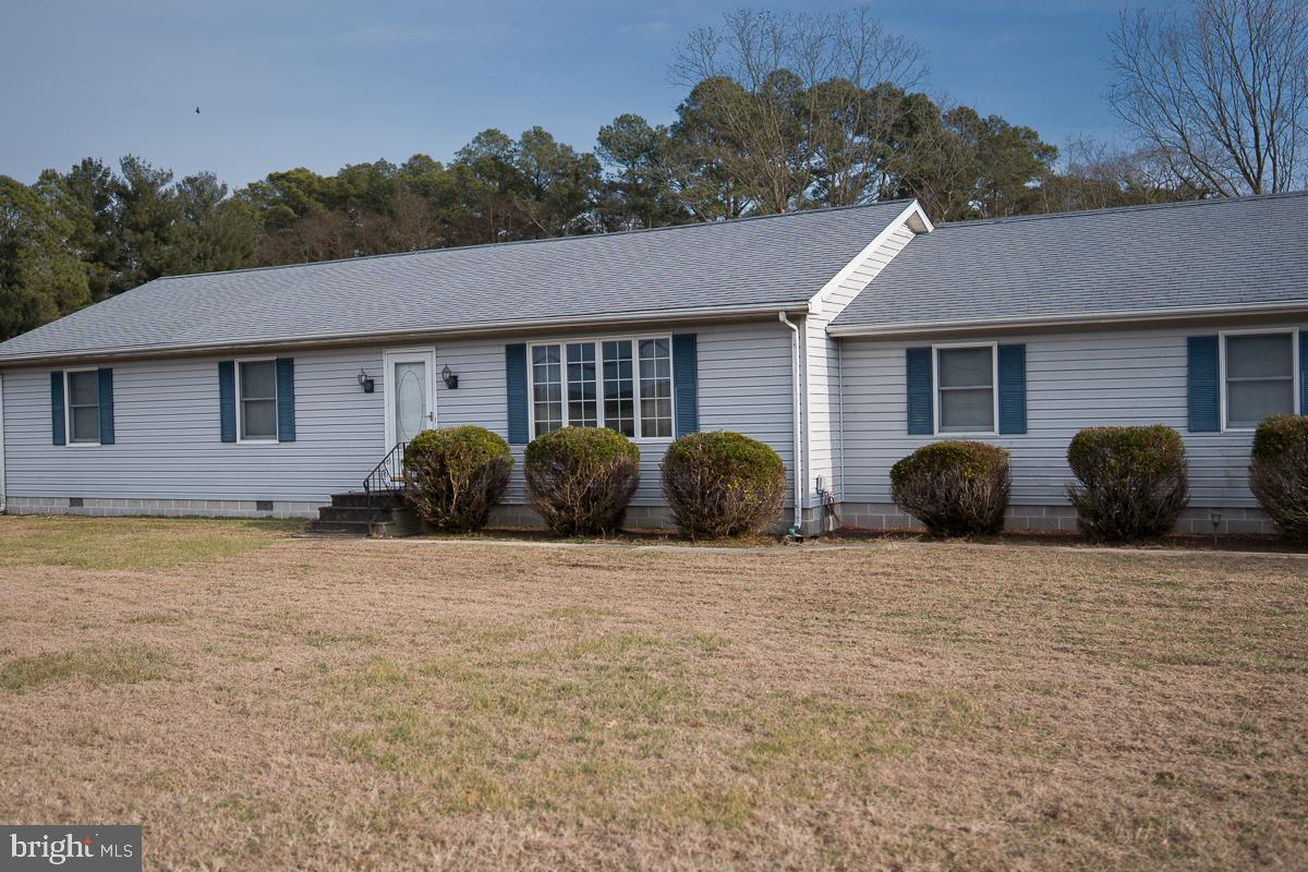 13148 Fleetwood Pond Road Seaford, DE 19973 - Photo 25 of 25 a view of a house with backyard and trees