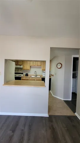 a view of workspace with wooden floor