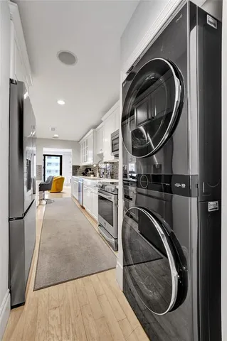 a view of living room washer and dryer