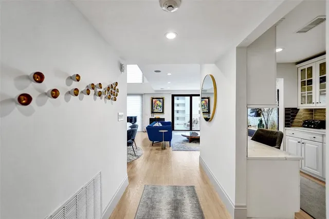 a view of a living room and dining room