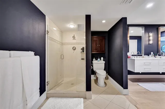 a bathroom with a tub and a shower
