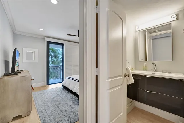 a view of a bathroom sink and mirror