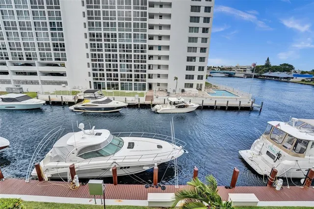 a terrace with outdoor seating and city view