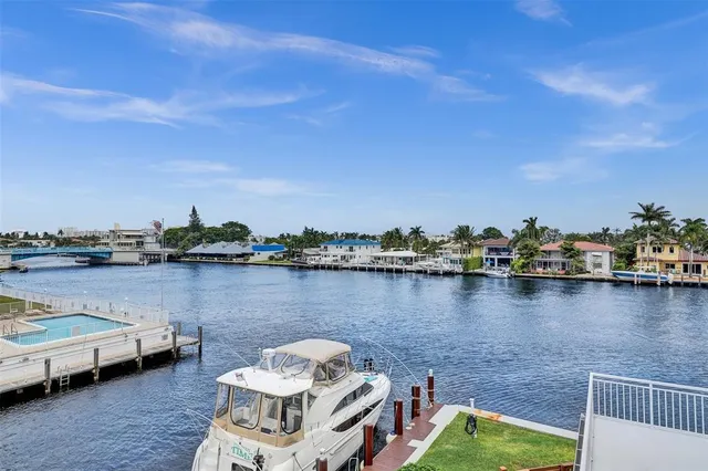 a building with palm trees in front of it