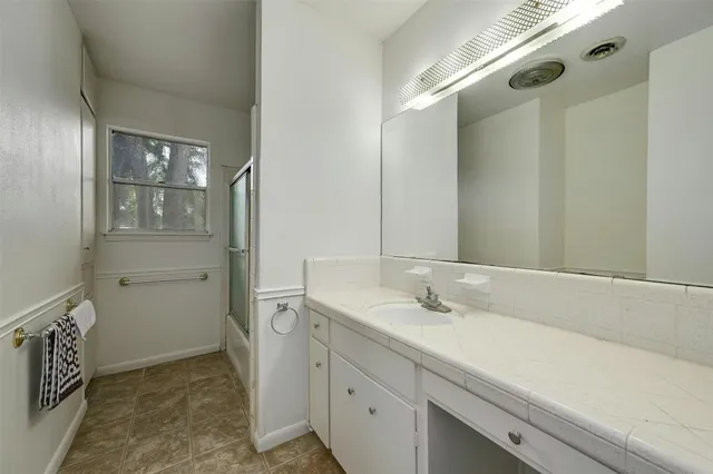 a house with trees in front of it