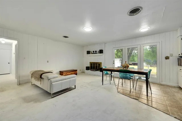 a living room with furniture and a table