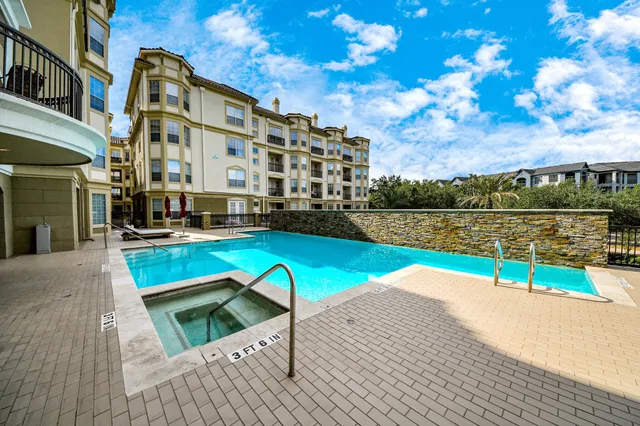 a view of swimming pool with a terrace