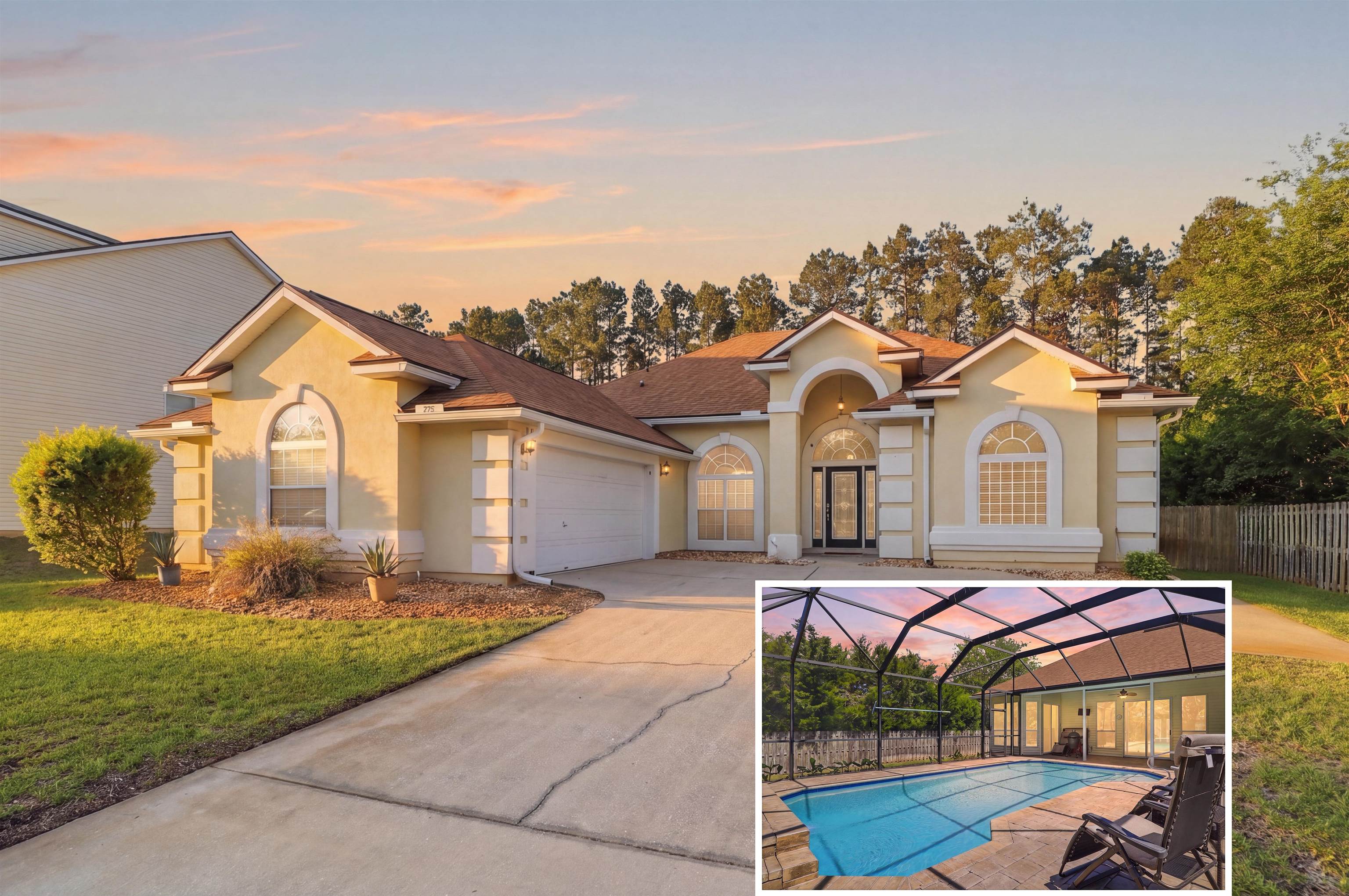 Mediterranean / spanish home featuring stucco siding, concrete driveway, a garage, and glass enclosure
