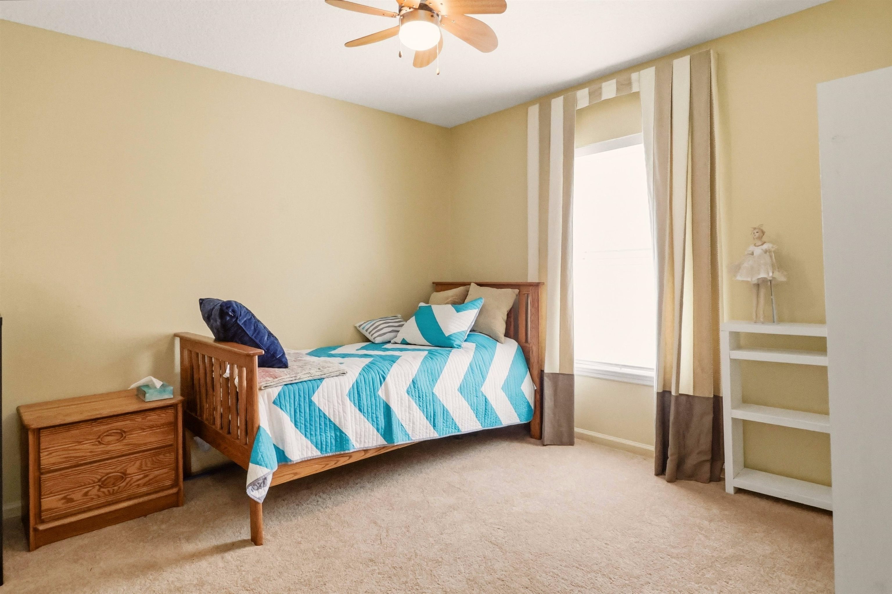 273 Whisper Ridge Drive St. Augustine, FL 32092 - Photo 34 of 44 Bedroom with light carpet and a ceiling fan