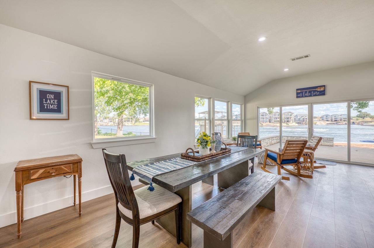 569 Ellen Williams Loop Kingsland, TX 78639 - Photo 13 of 29 a living room with furniture and floor to ceiling windows