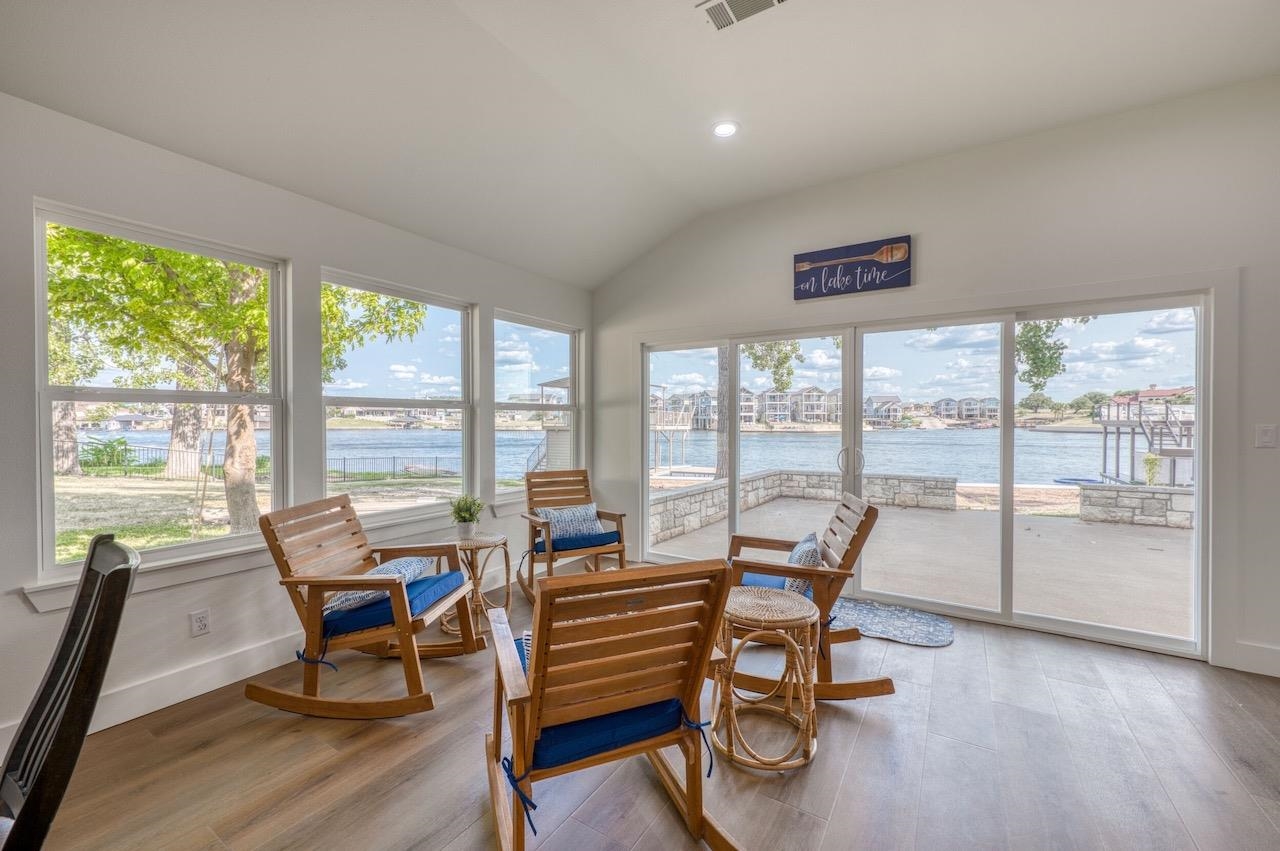 569 Ellen Williams Loop Kingsland, TX 78639 - Photo 17 of 29 a living room with furniture and floor to ceiling window