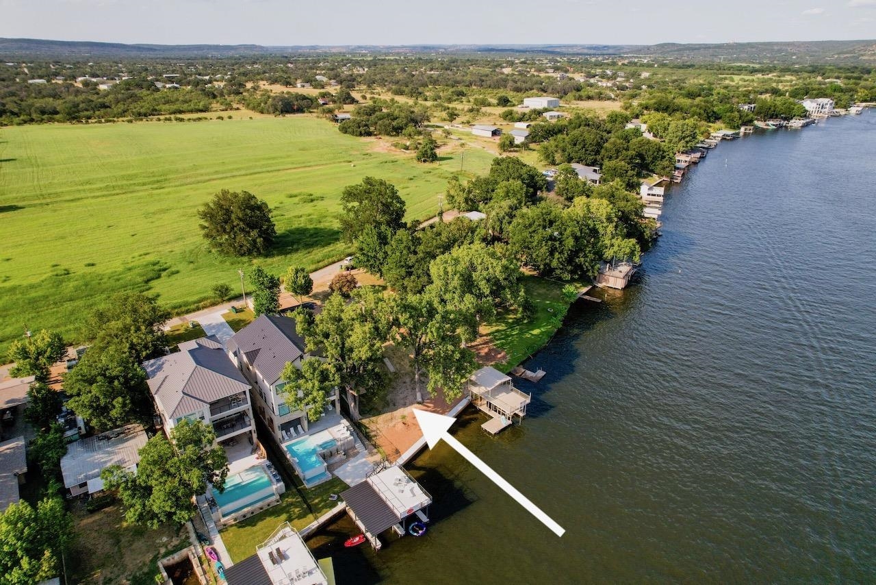 569 Ellen Williams Loop Kingsland, TX 78639 - Photo 3 of 29 an aerial view of ocean and residential houses with outdoor space
