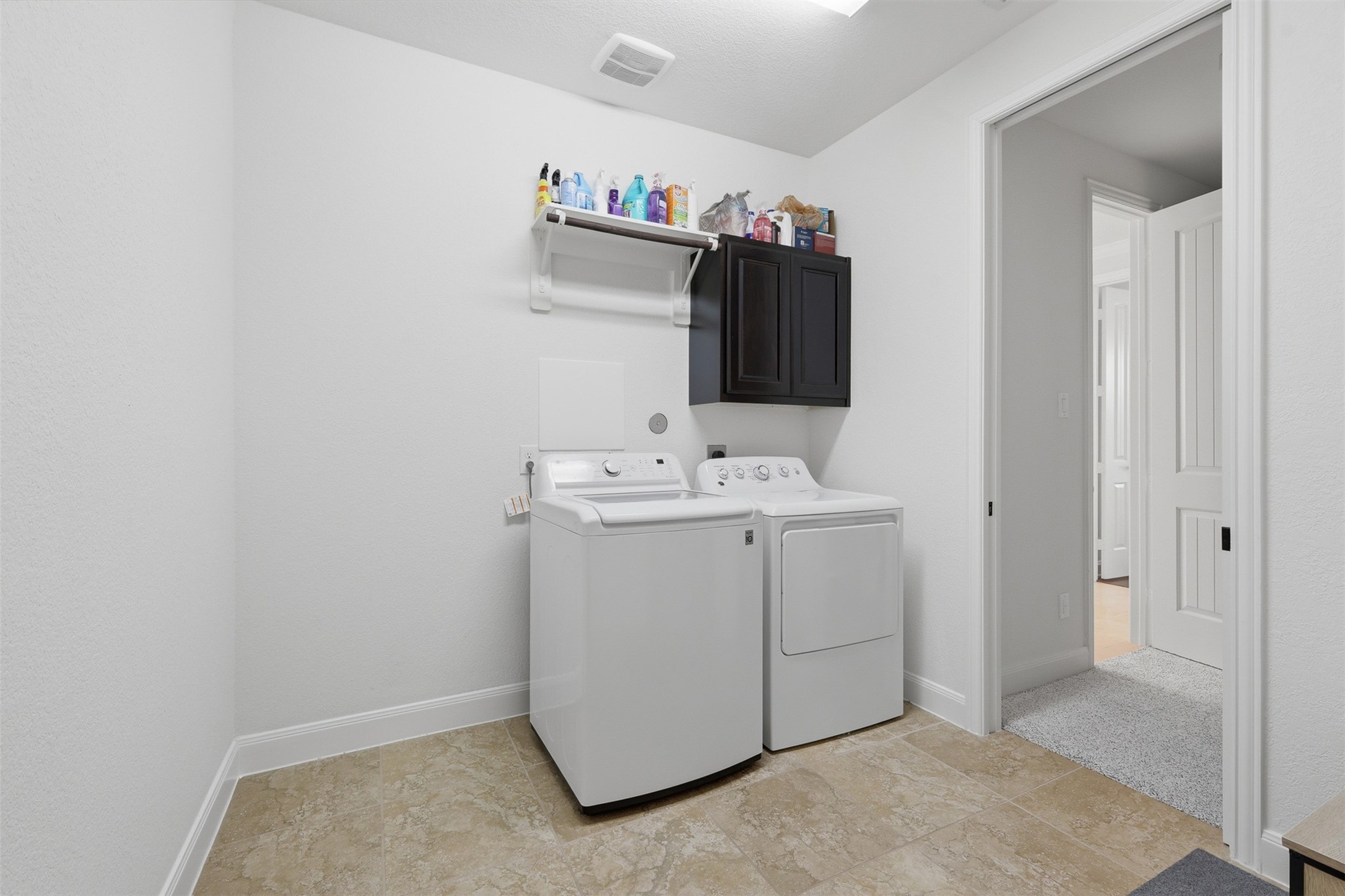 6835 Preston Grove Drive Spring, TX 77389 - Photo 30 of 49 a utility room with dryer and washer