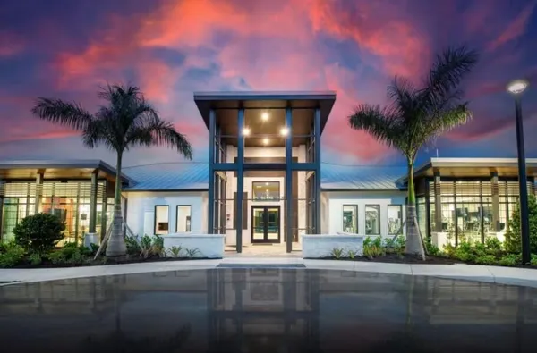 swimming pool view with couches and chairs