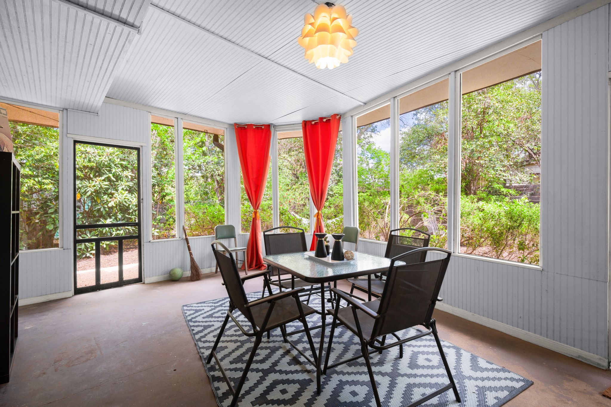 4702 Lasso Path Austin, TX 78745 - Photo 12 of 34 a dining room with furniture and a floor to ceiling window