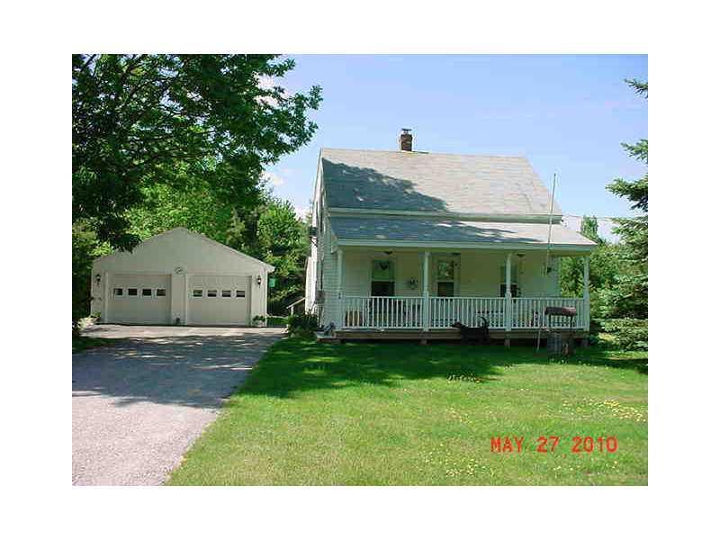 26 Pope Road Windham, ME 04062 - Photo 11 of 12 Exterior Front. Summer photo showing...