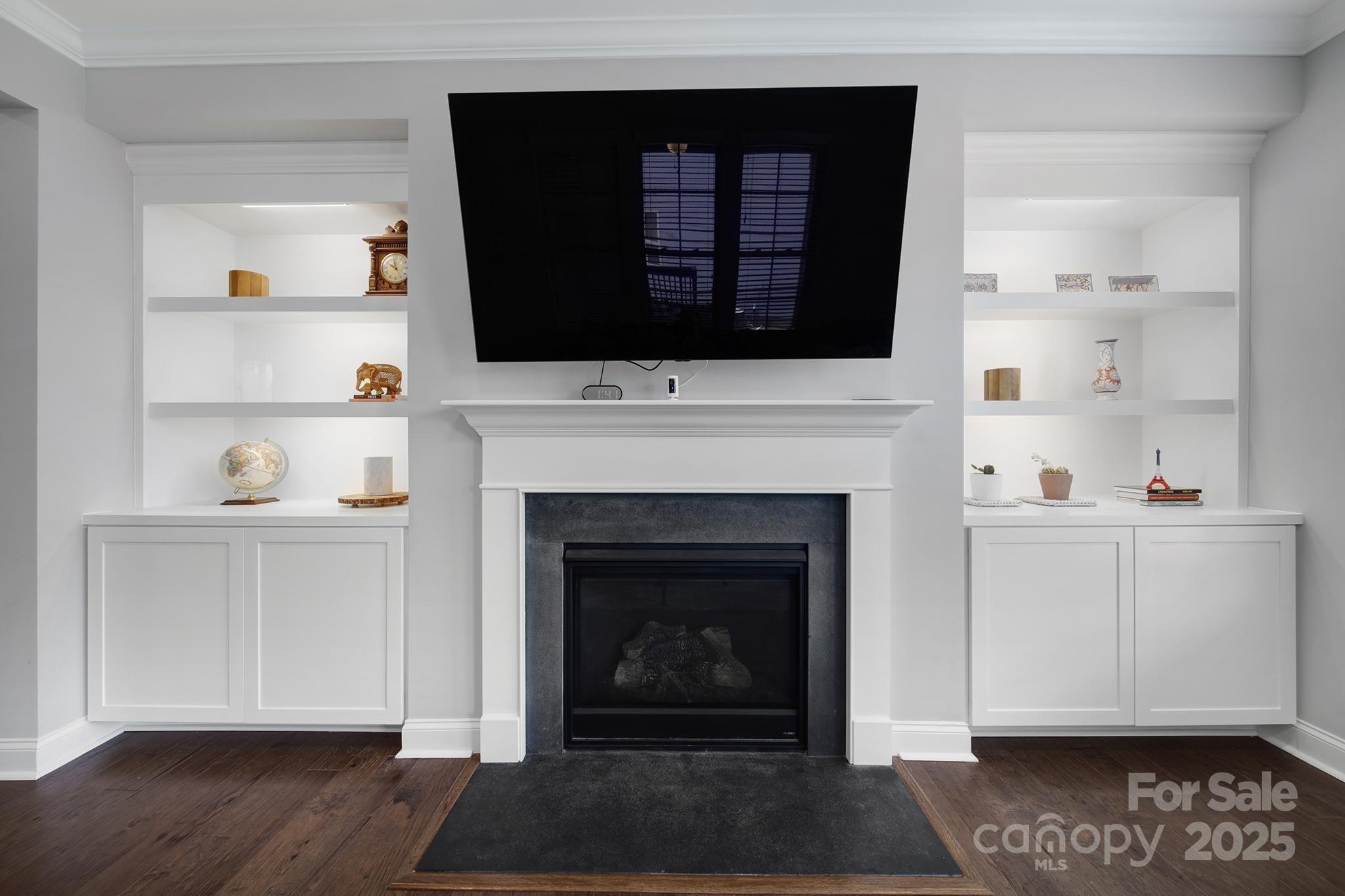 1001 Emory Lane Fort Mill, SC 29708 - Photo 13 of 45 a living room with a fireplace and a flat screen tv