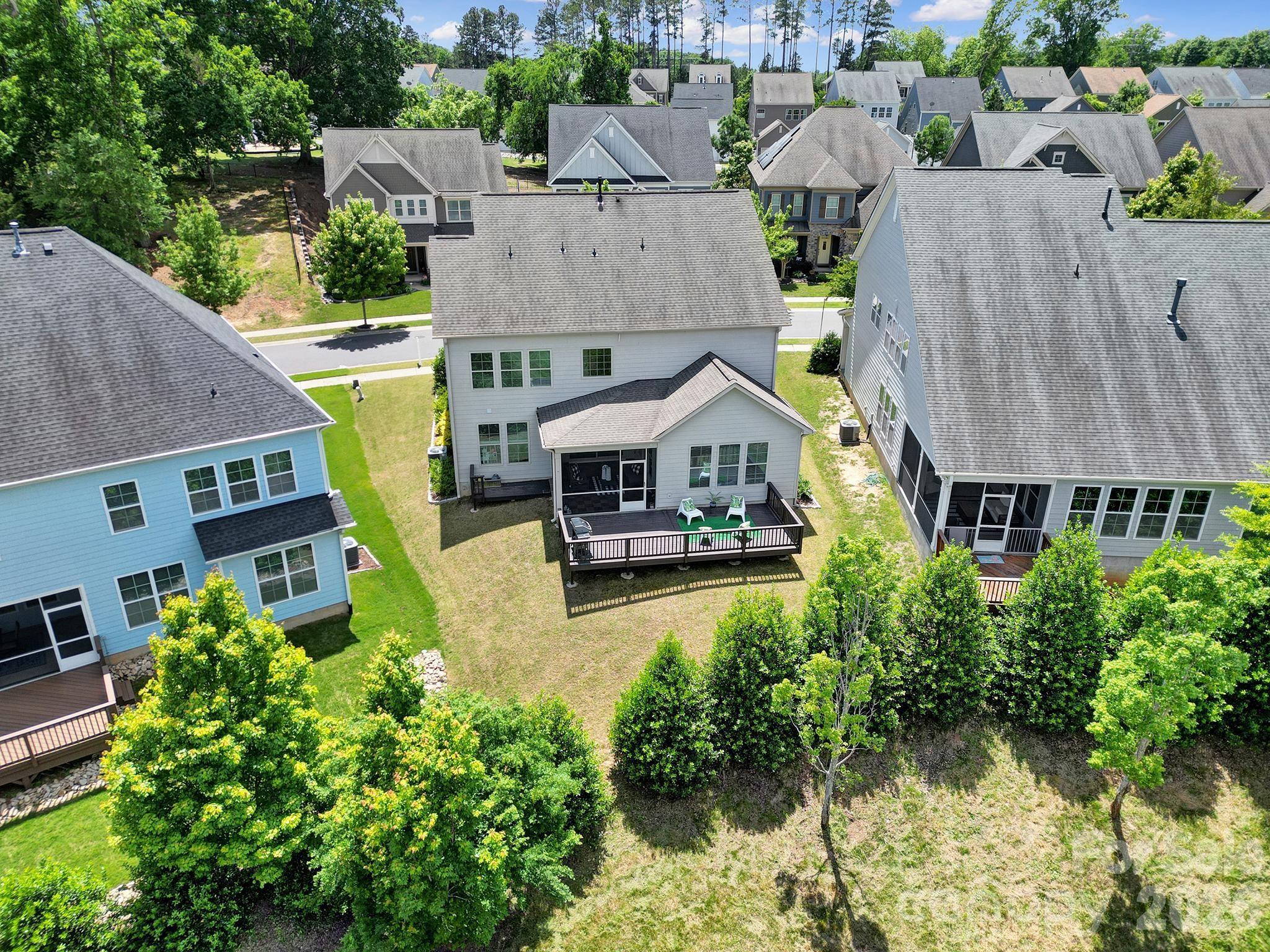 1001 Emory Lane Fort Mill, SC 29708 - Photo 15 of 18 an aerial view of a house with swimming pool and a yard