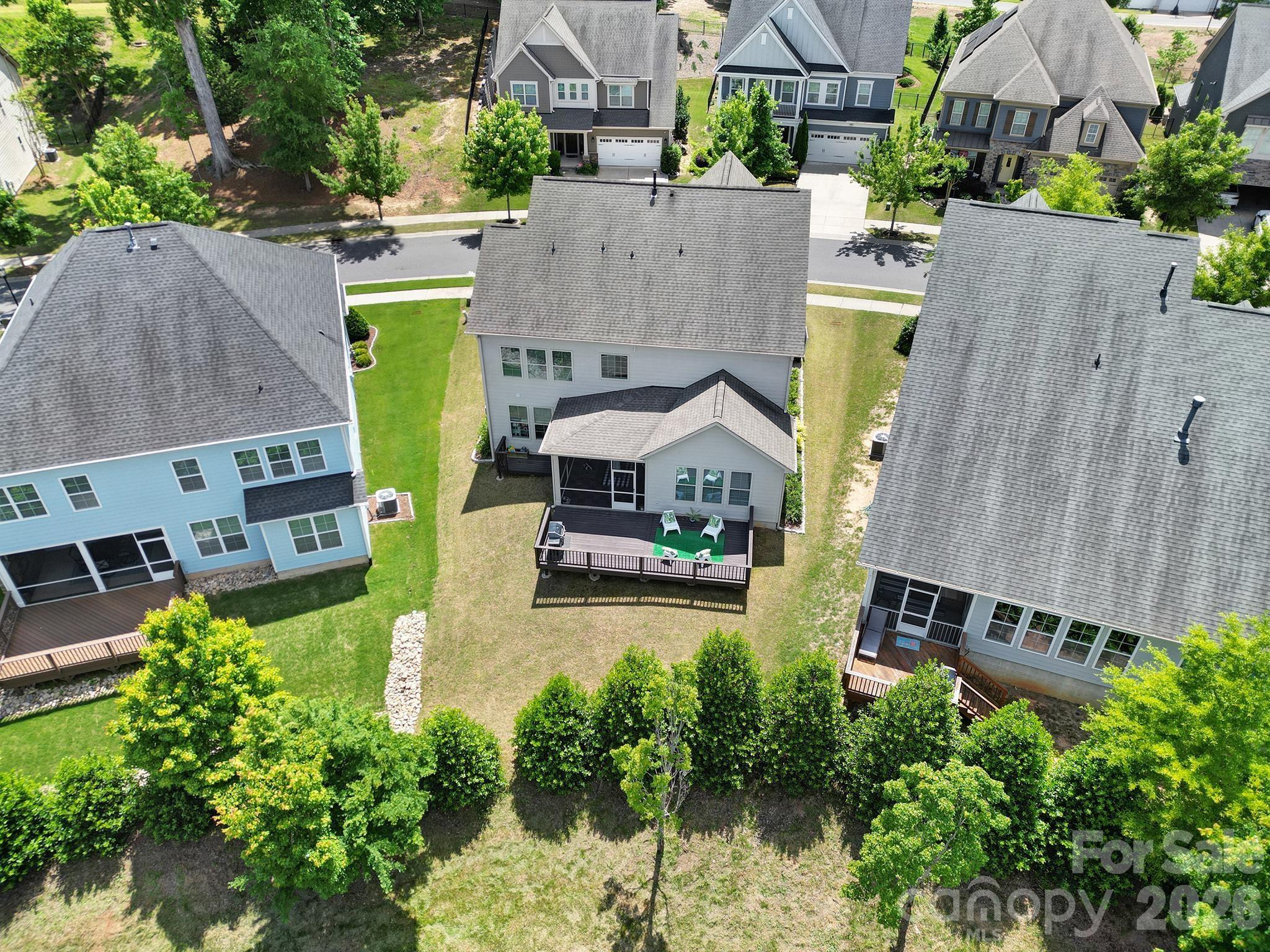 1001 Emory Lane Fort Mill, SC 29708 - Photo 16 of 18 an aerial view of a house with a garden and a yard