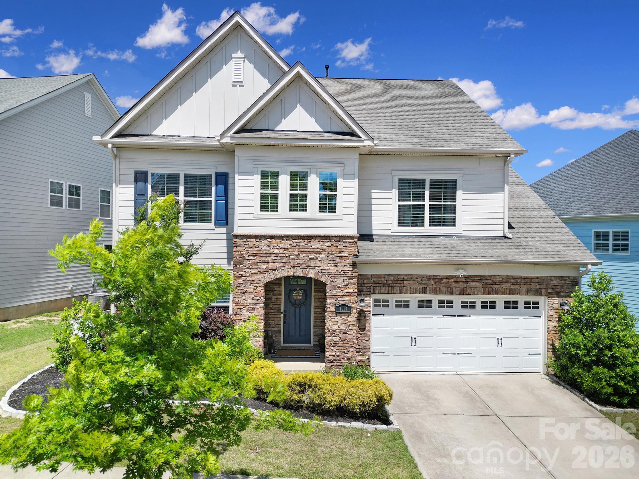 1001 Emory Lane Fort Mill, SC 29708 - Photo 17 of 18 a front view of a house with a garden