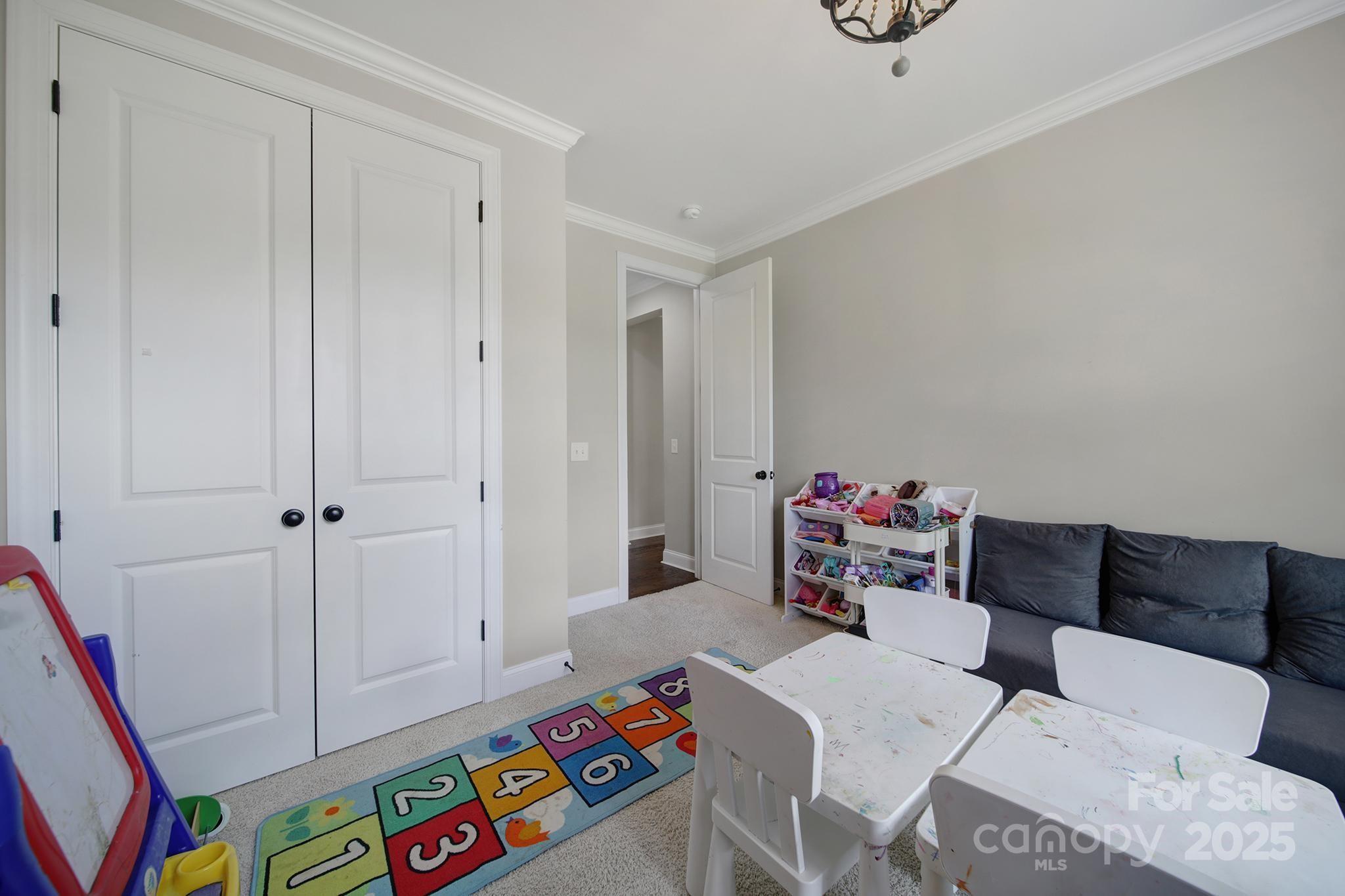 1001 Emory Lane Fort Mill, SC 29708 - Photo 19 of 45 a living room with furniture and a wooden floor