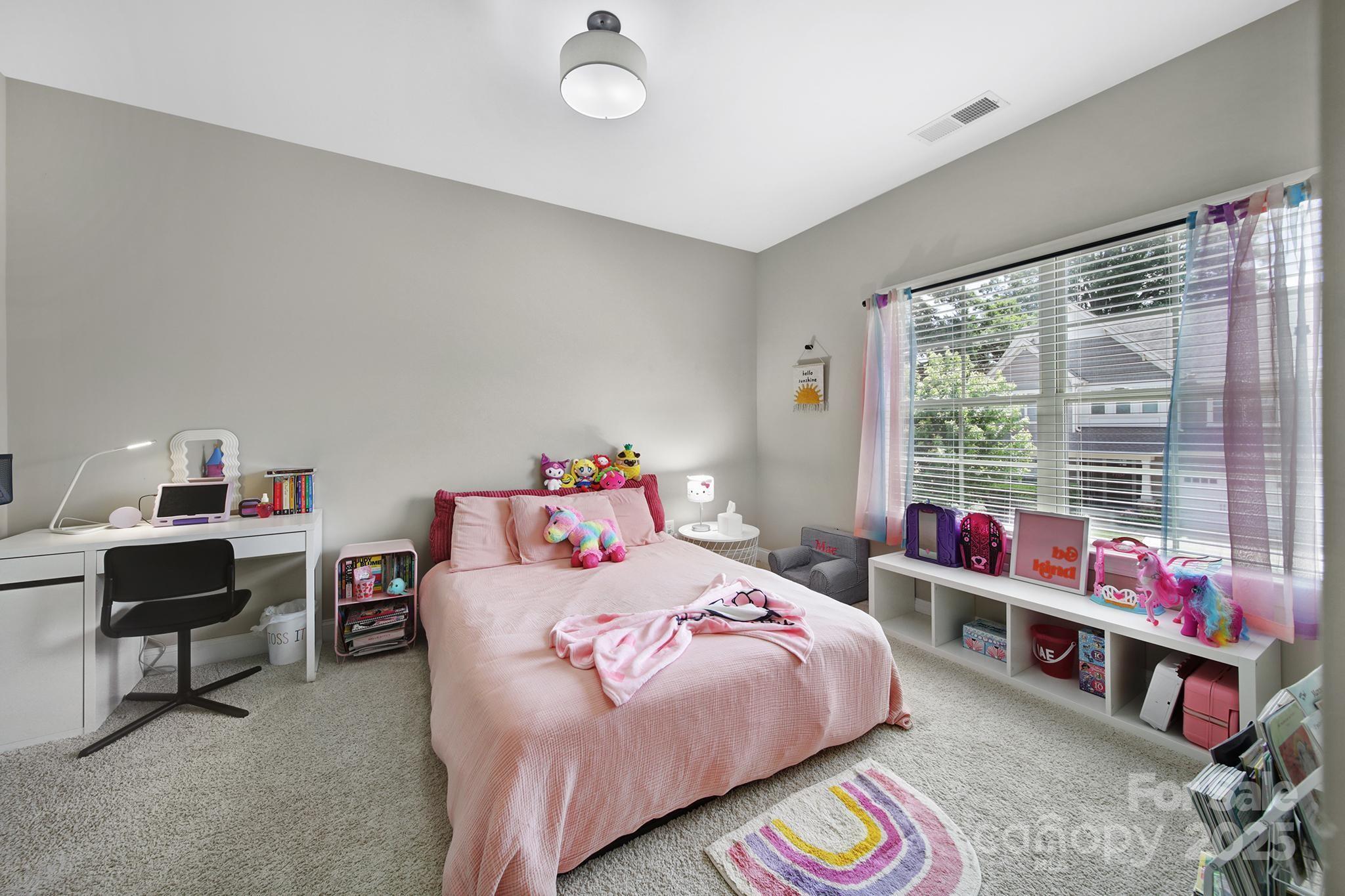 1001 Emory Lane Fort Mill, SC 29708 - Photo 27 of 45 a bedroom with a bed and a window