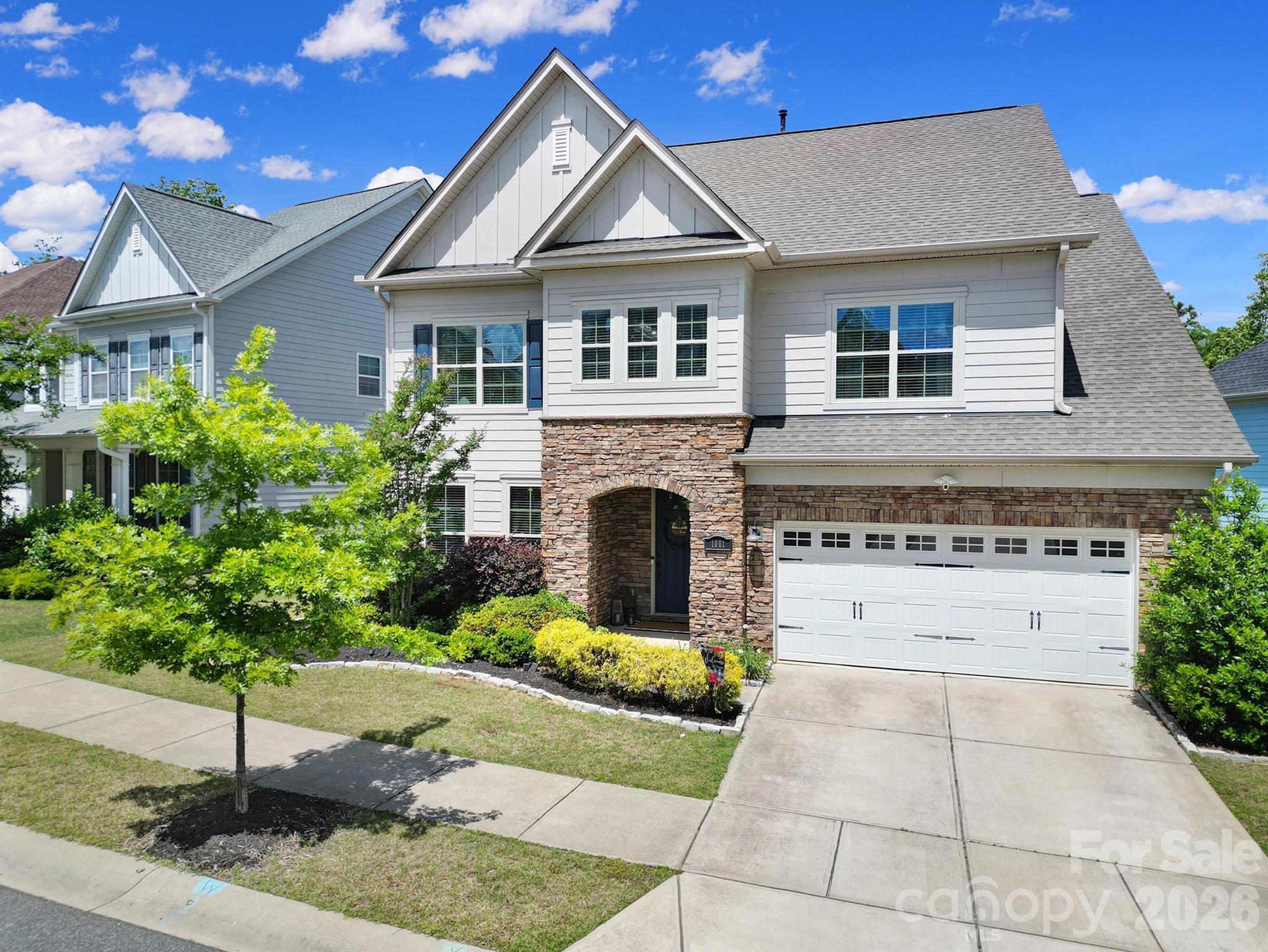 1001 Emory Lane Fort Mill, SC 29708 - Photo 3 of 18 a front view of a house with a garden