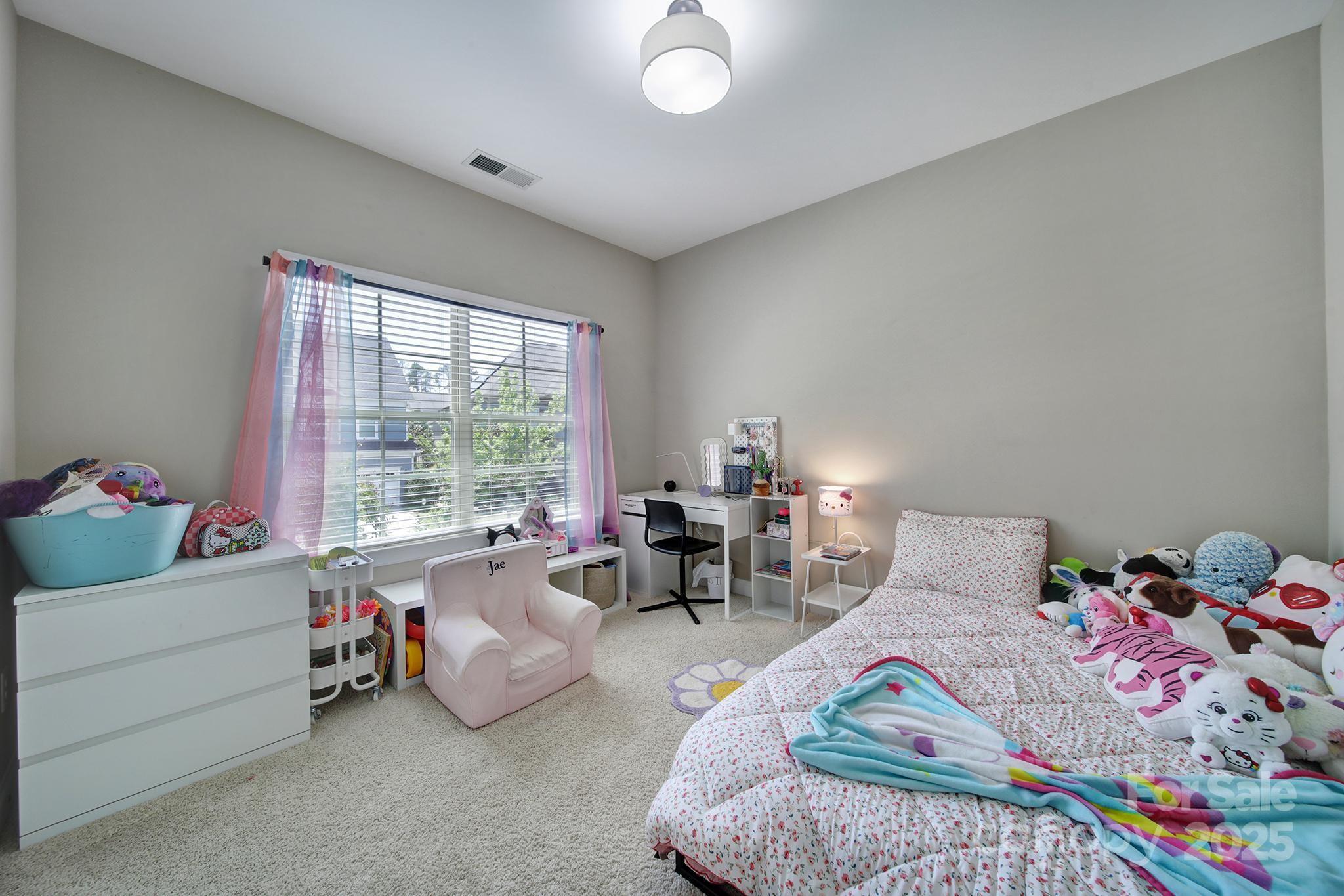 1001 Emory Lane Fort Mill, SC 29708 - Photo 31 of 45 a bedroom with furniture and a bed