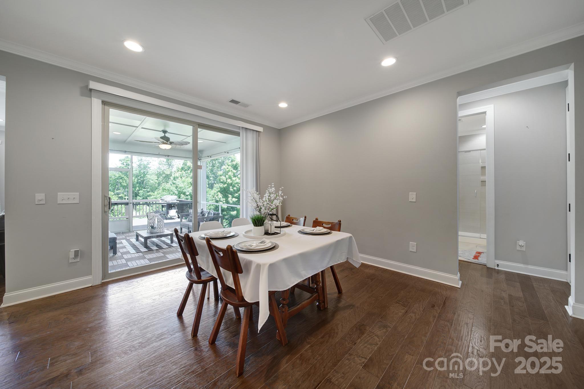 1001 Emory Lane Fort Mill, SC 29708 - Photo 10 of 45 a view of a dining room with furniture window and wooden floor