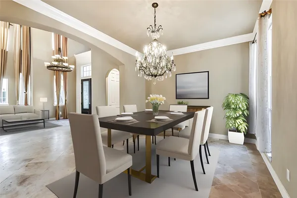 a view of a dining room with furniture and a chandelier