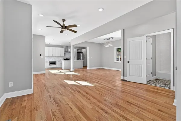 a view of a livingroom with wooden floor