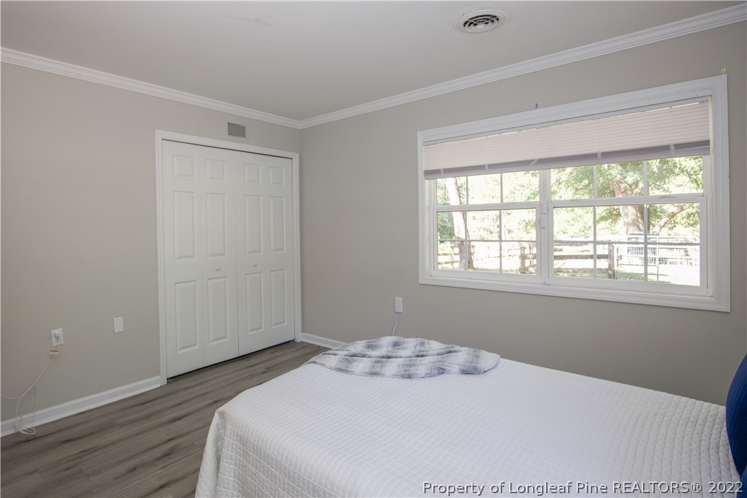 321 Pinecrest Court Road Aberdeen, NC 28315 - Photo 29 of 50 a bedroom with a bed and a window