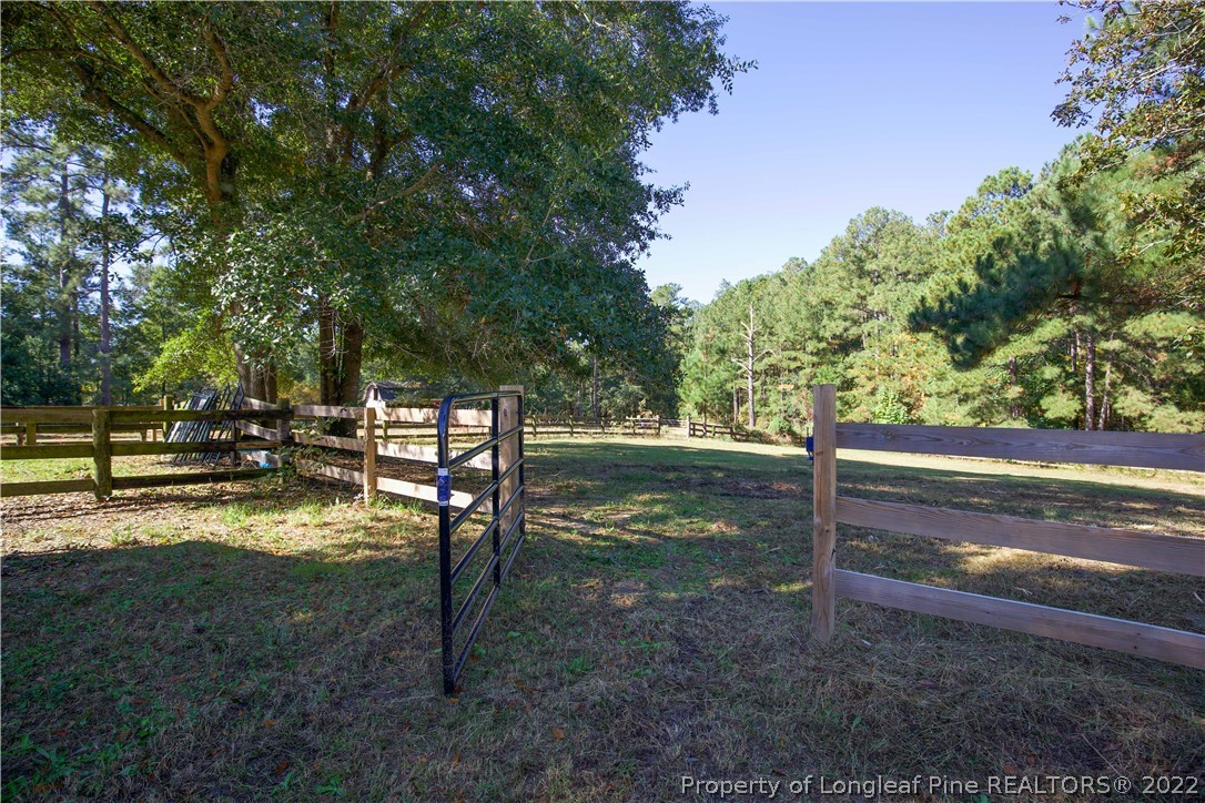 321 Pinecrest Court Road Aberdeen, NC 28315 - Photo 49 of 50 a view of backyard with green space