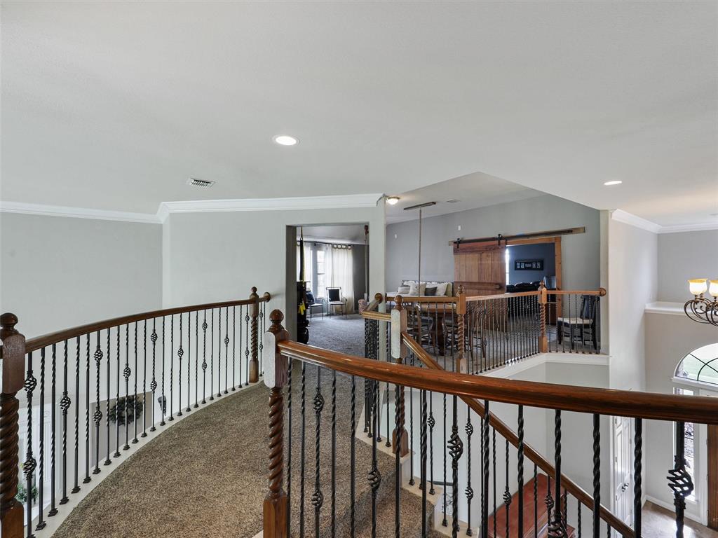 671 Countryside Drive Fairview, TX 75069 - Photo 20 of 32 a view of a living room and dining room
