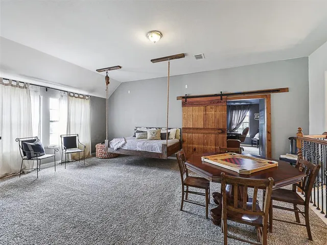 a workspace with furniture and window