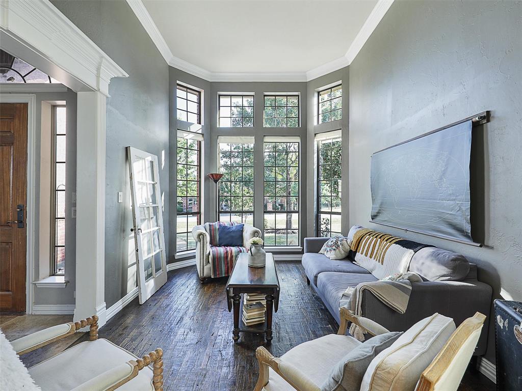 671 Countryside Drive Fairview, TX 75069 - Photo 4 of 32 a living room with furniture and a large window