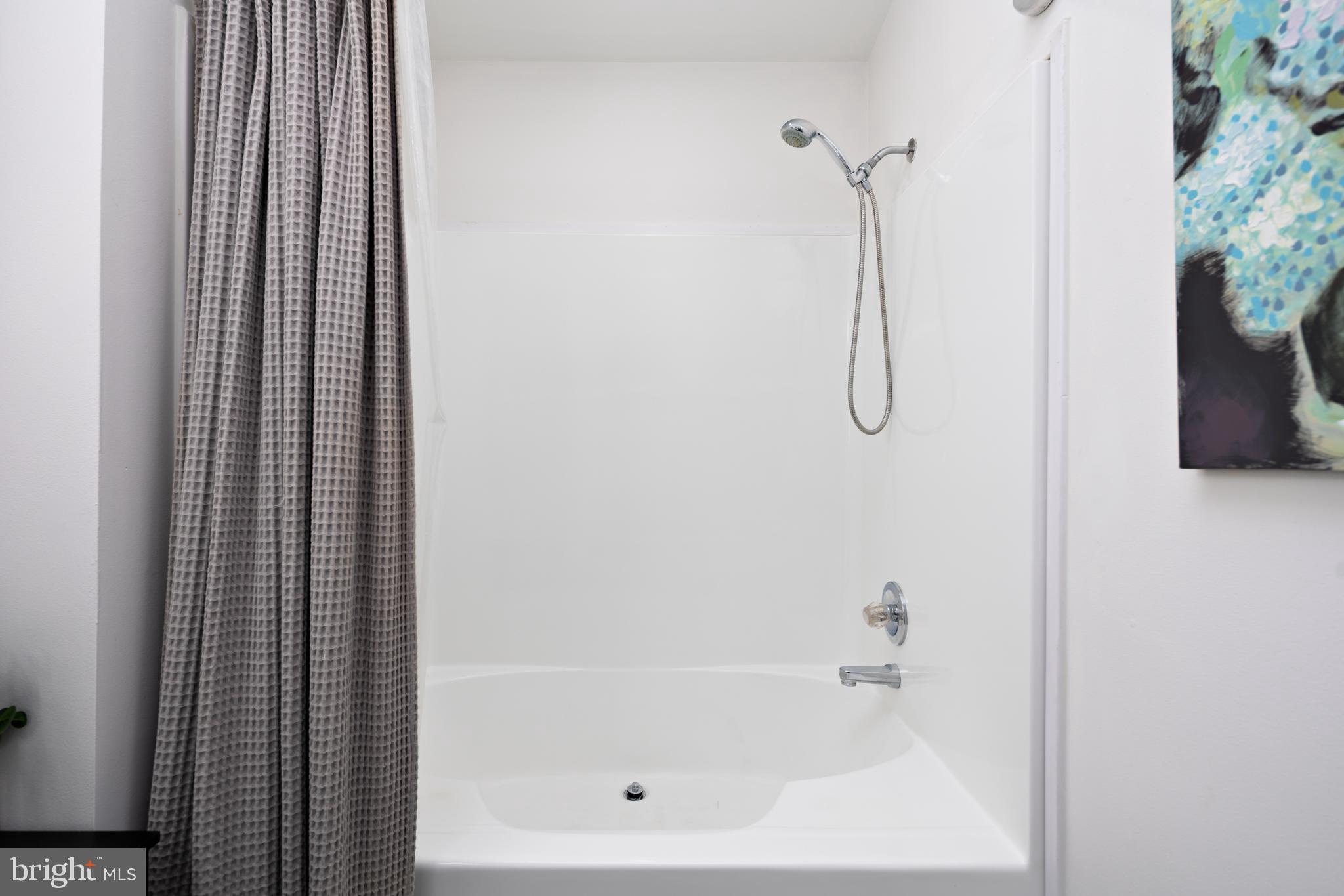 7213 Waterloo Pass Elkridge, MD 21075 - Photo 21 of 60 a bathroom with a shower