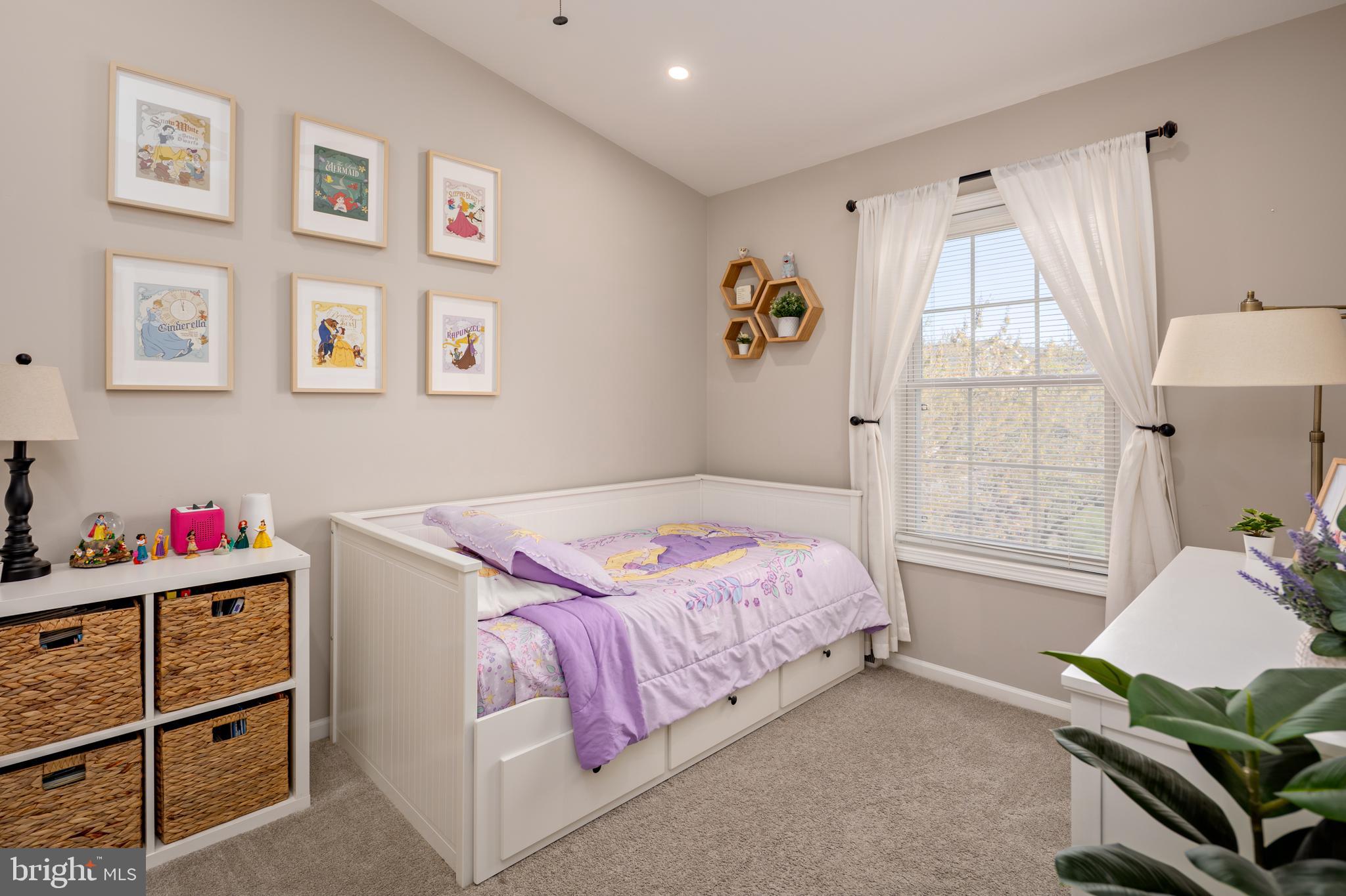 7213 Waterloo Pass Elkridge, MD 21075 - Photo 26 of 60 a bedroom with a bed and a window