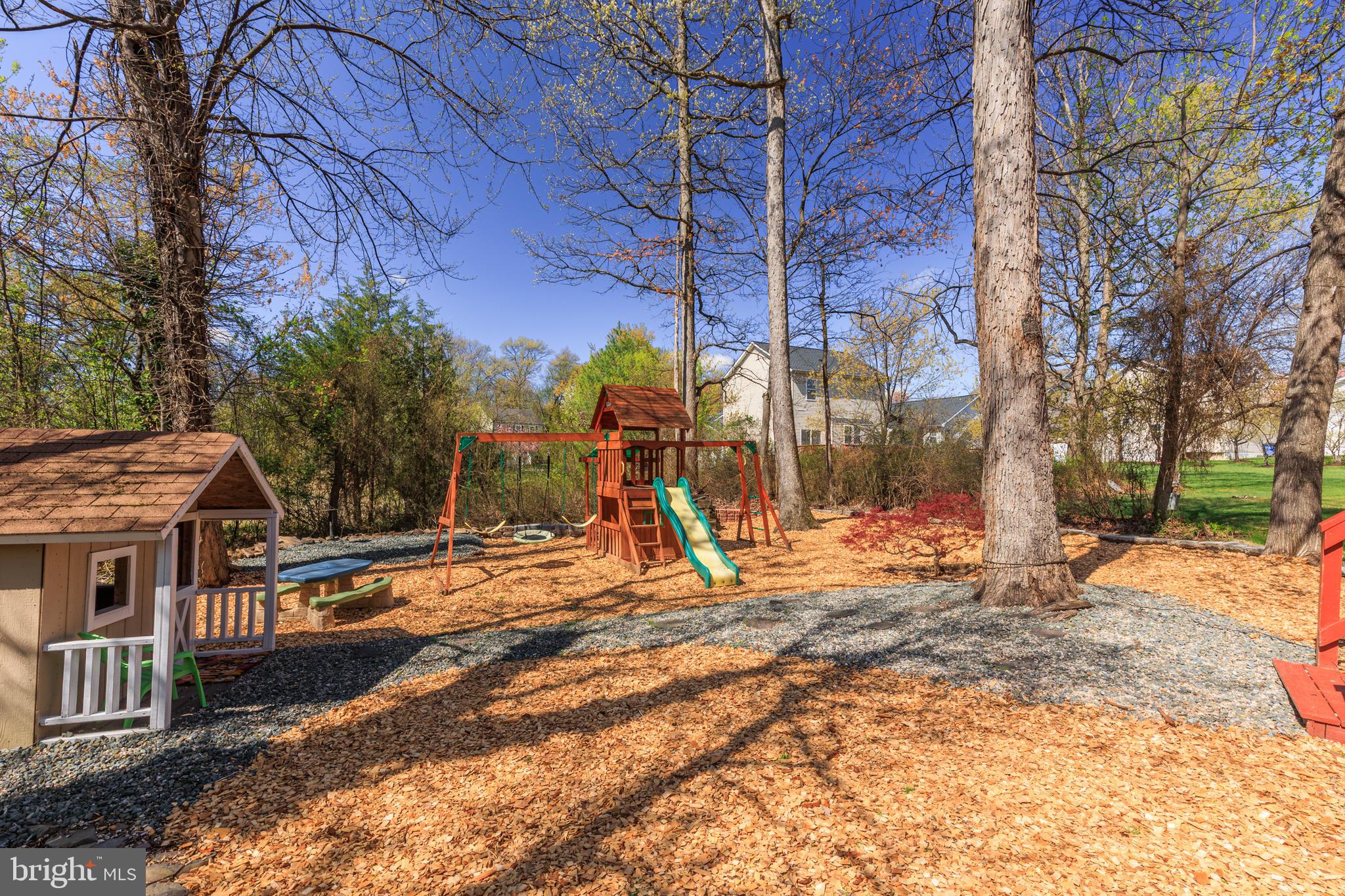 7213 Waterloo Pass Elkridge, MD 21075 - Photo 39 of 60 a view of a backyard with a tree