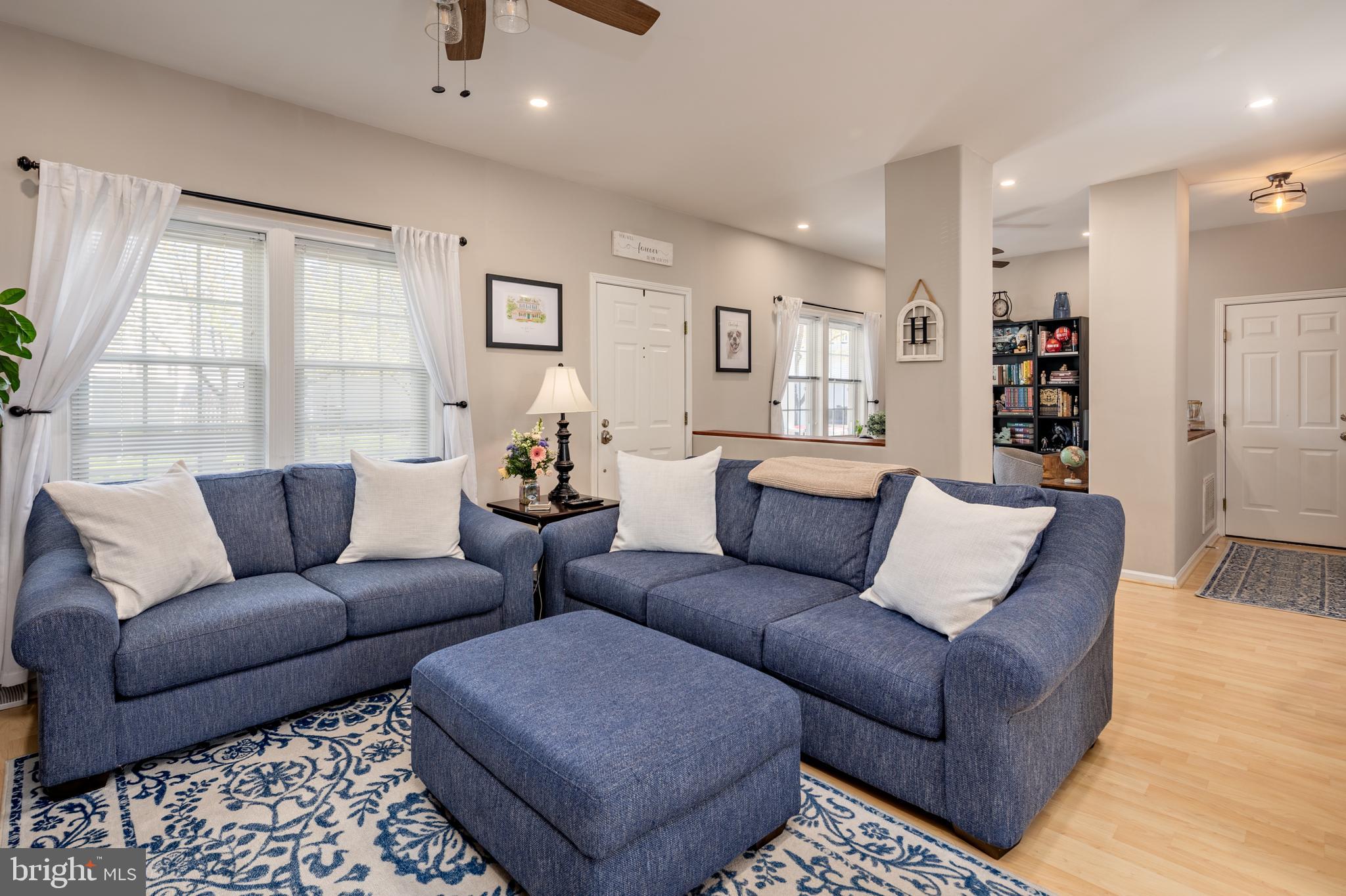 7213 Waterloo Pass Elkridge, MD 21075 - Photo 10 of 60 a living room with furniture and a large window