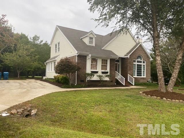 5417 Millrace Trail Raleigh, NC 27606 - Photo 2 of 29 Driveway leads to side door into Laundry room