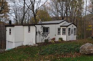 6 Barnard Road Patterson, NY 12563 - Photo 1 of 1 a front view of a house with garden