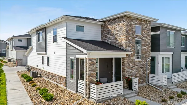 a front view of a house with glass windows