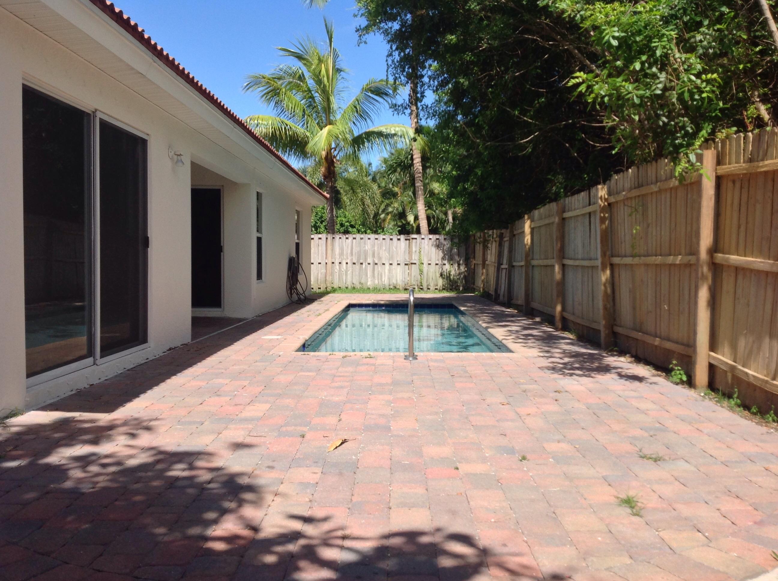 4830 South Lee Road Delray Beach, FL 33445 - Photo 16 of 31 Paved deck with patios