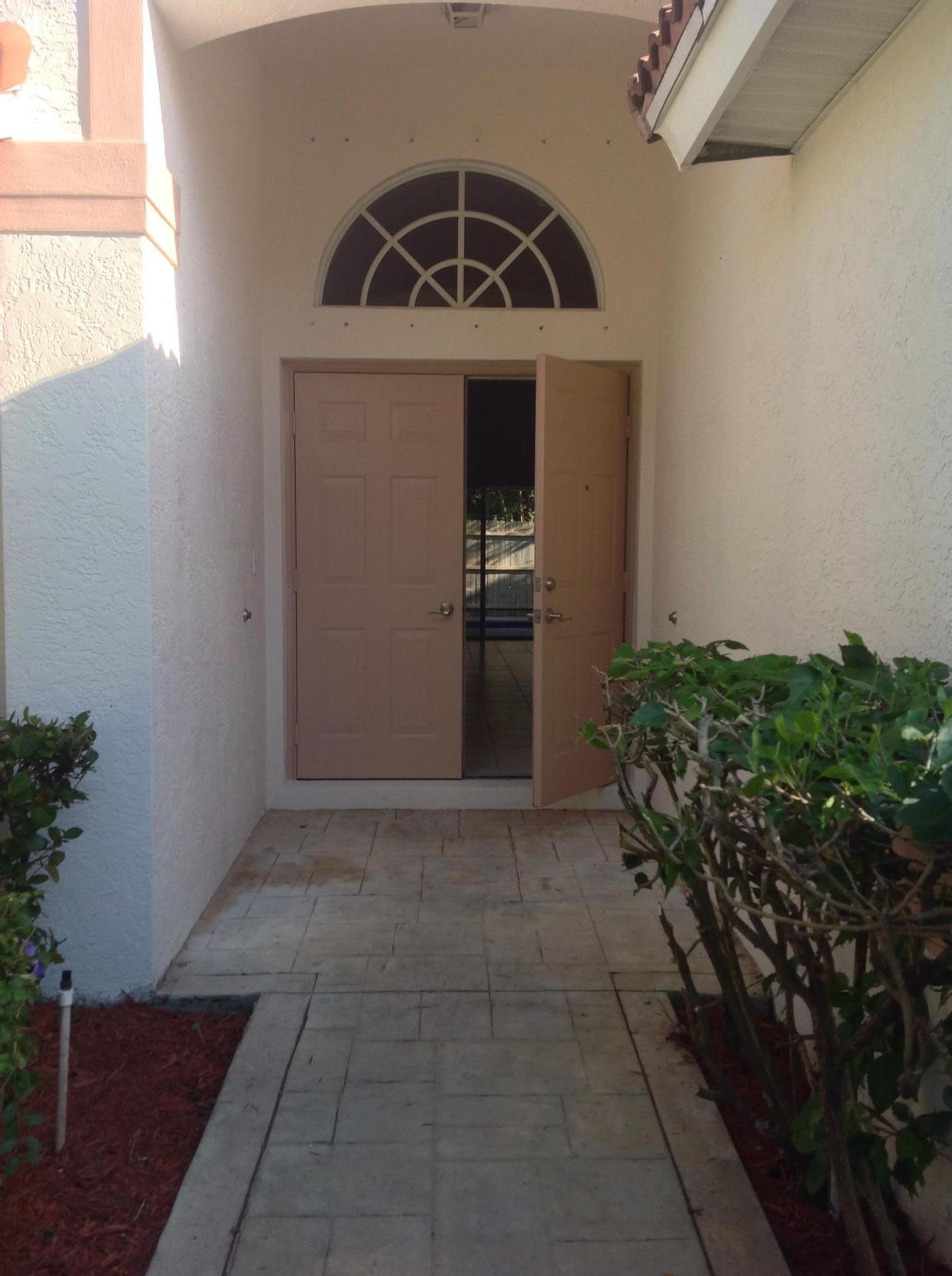 4830 South Lee Road Delray Beach, FL 33445 - Photo 3 of 31 Front Door