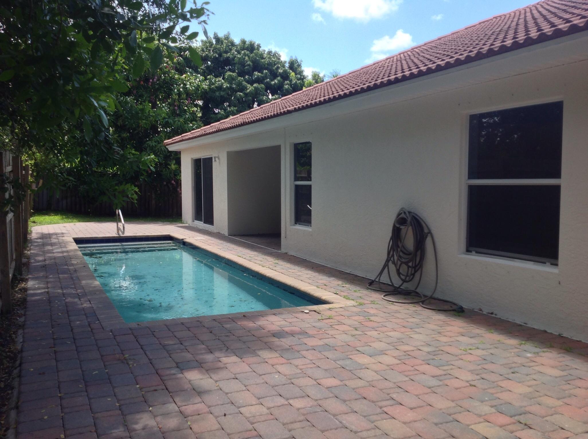 4830 South Lee Road Delray Beach, FL 33445 - Photo 5 of 31 Rear Exterior
