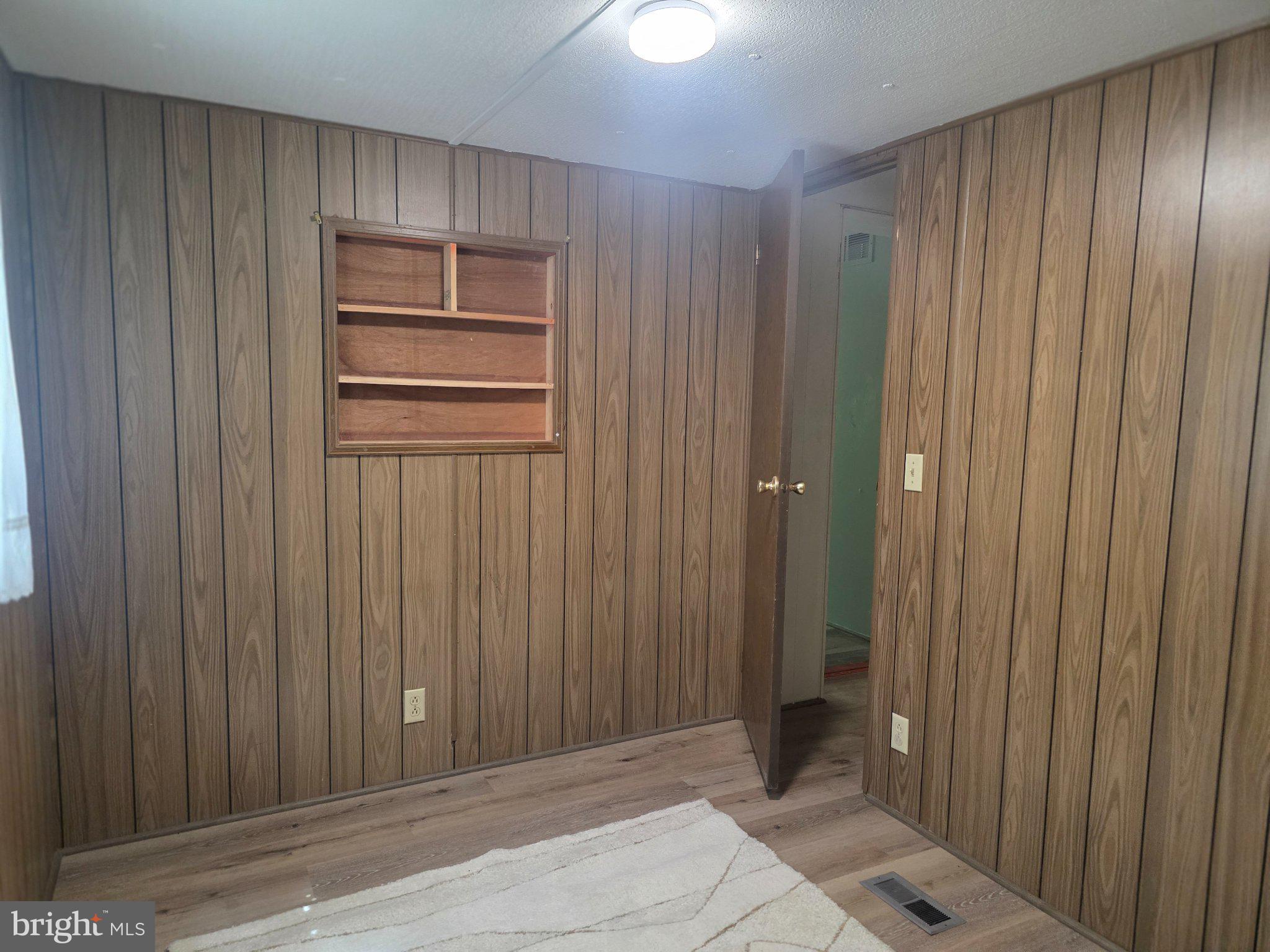 357 Gunsmoke Road Warfordsburg, PA 17267 - Photo 15 of 23 Cozy room with warm wood paneling.