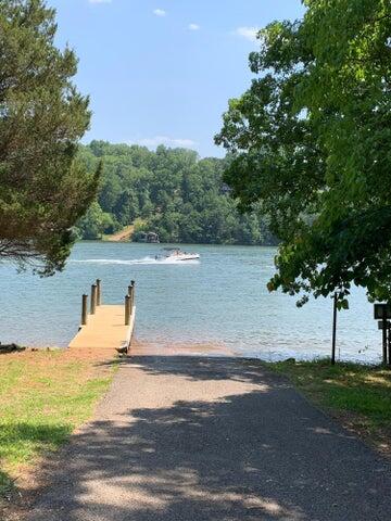 Lot 19 Gap Bridge Road Moneta, VA 24121 - Photo 11 of 16 a view of a lake with beach and trees